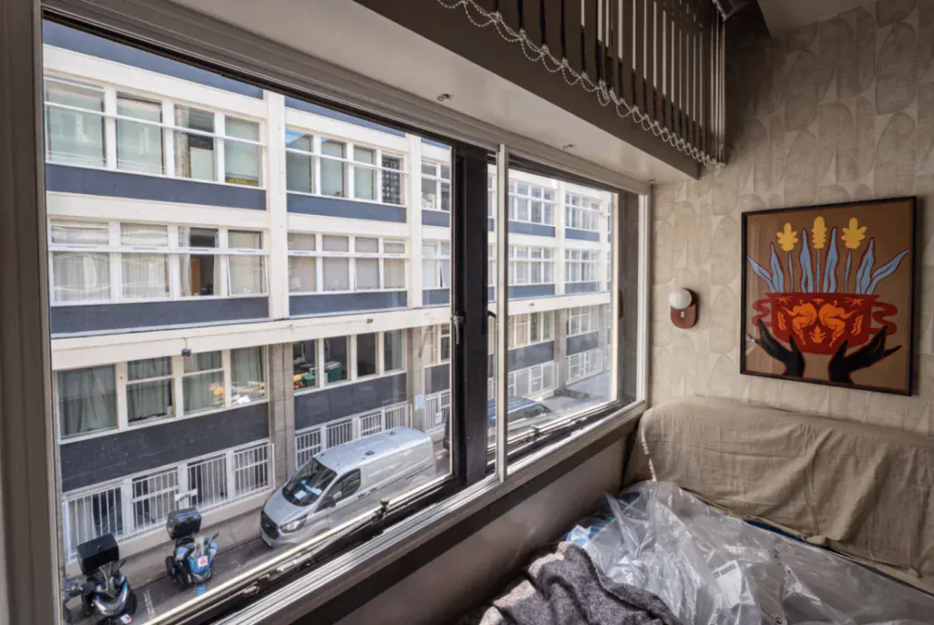 Secondary glazing across a city apartment window