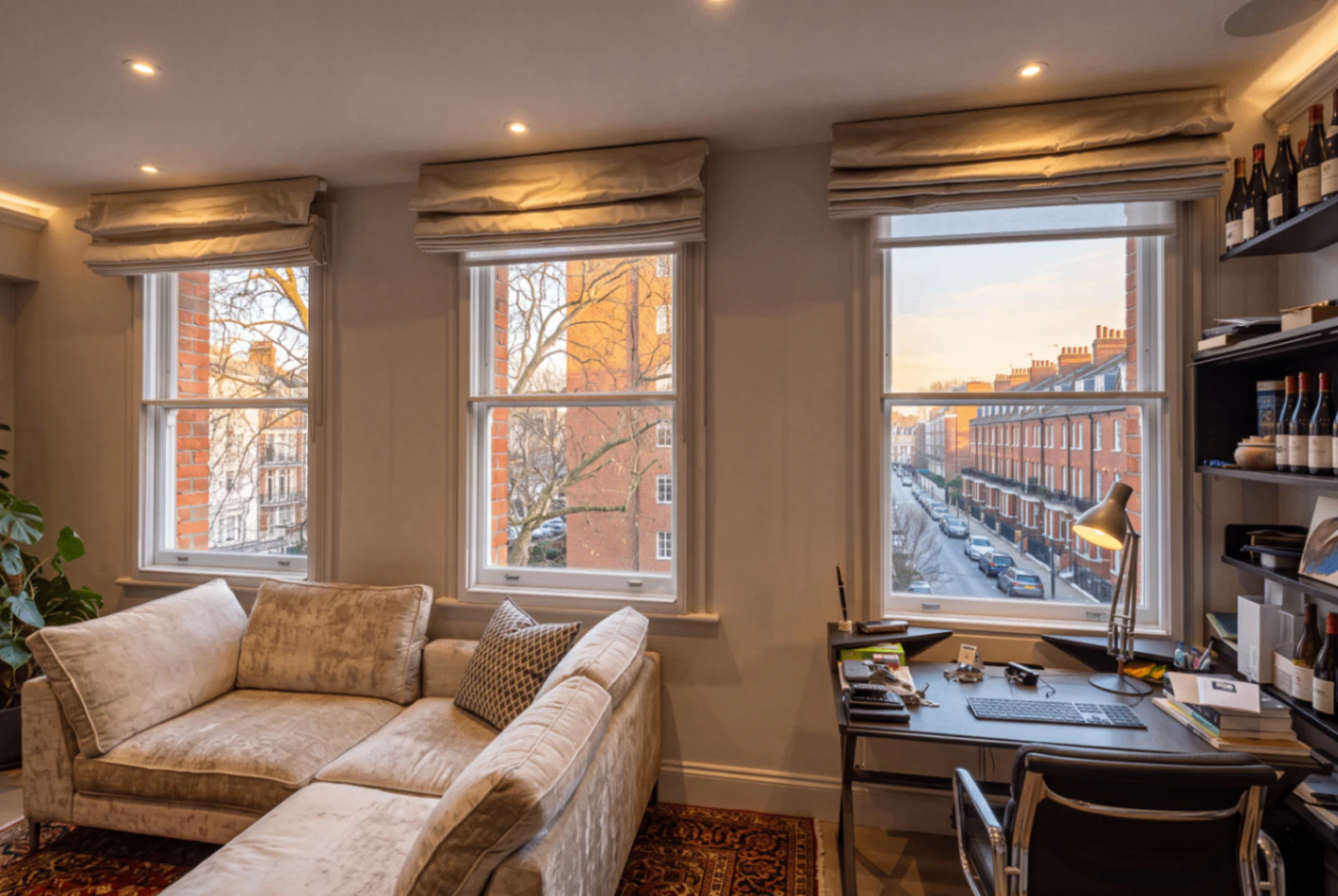 Secondary glazing across three sash windows in a sitting room