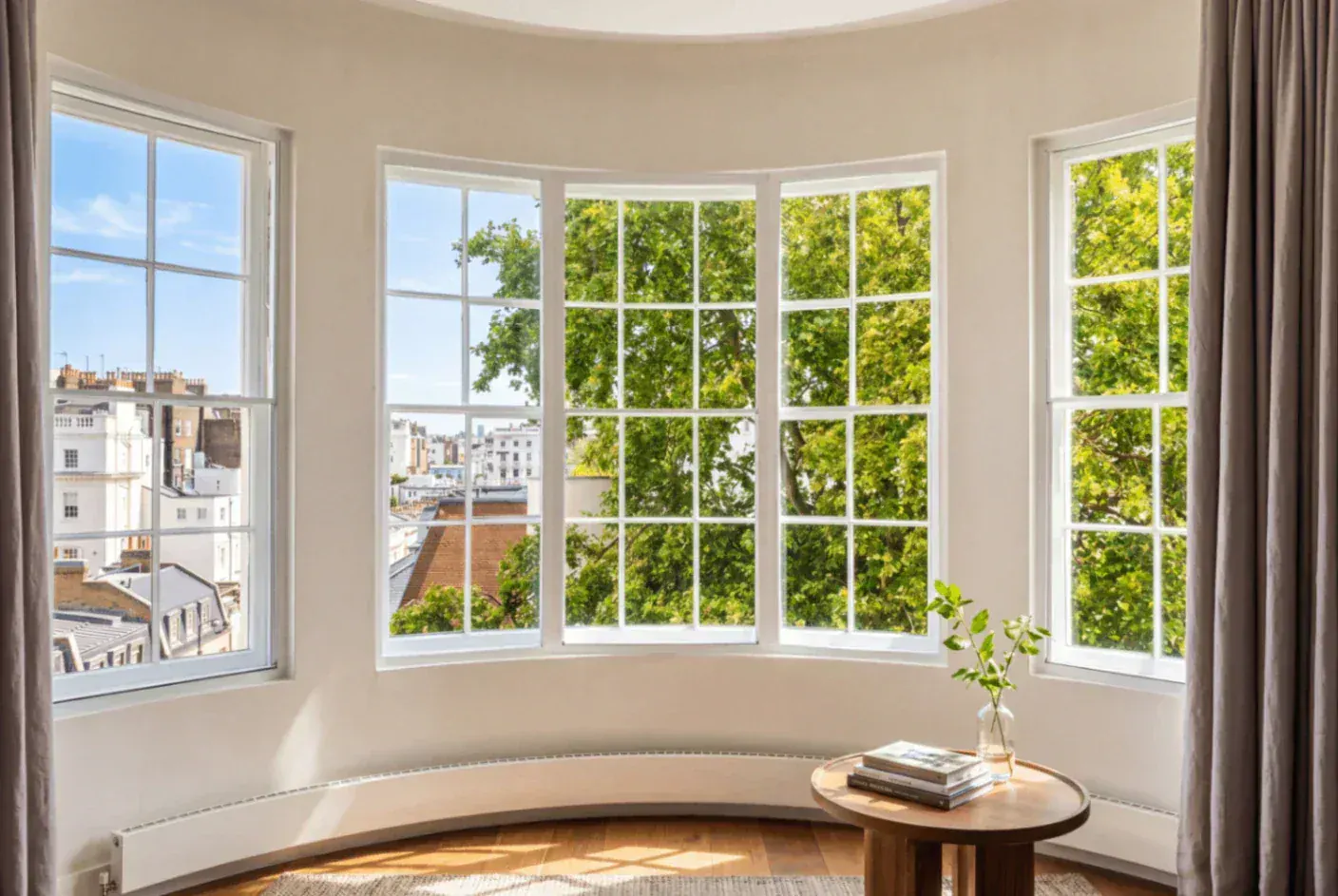 Secondary glazing around a bay window