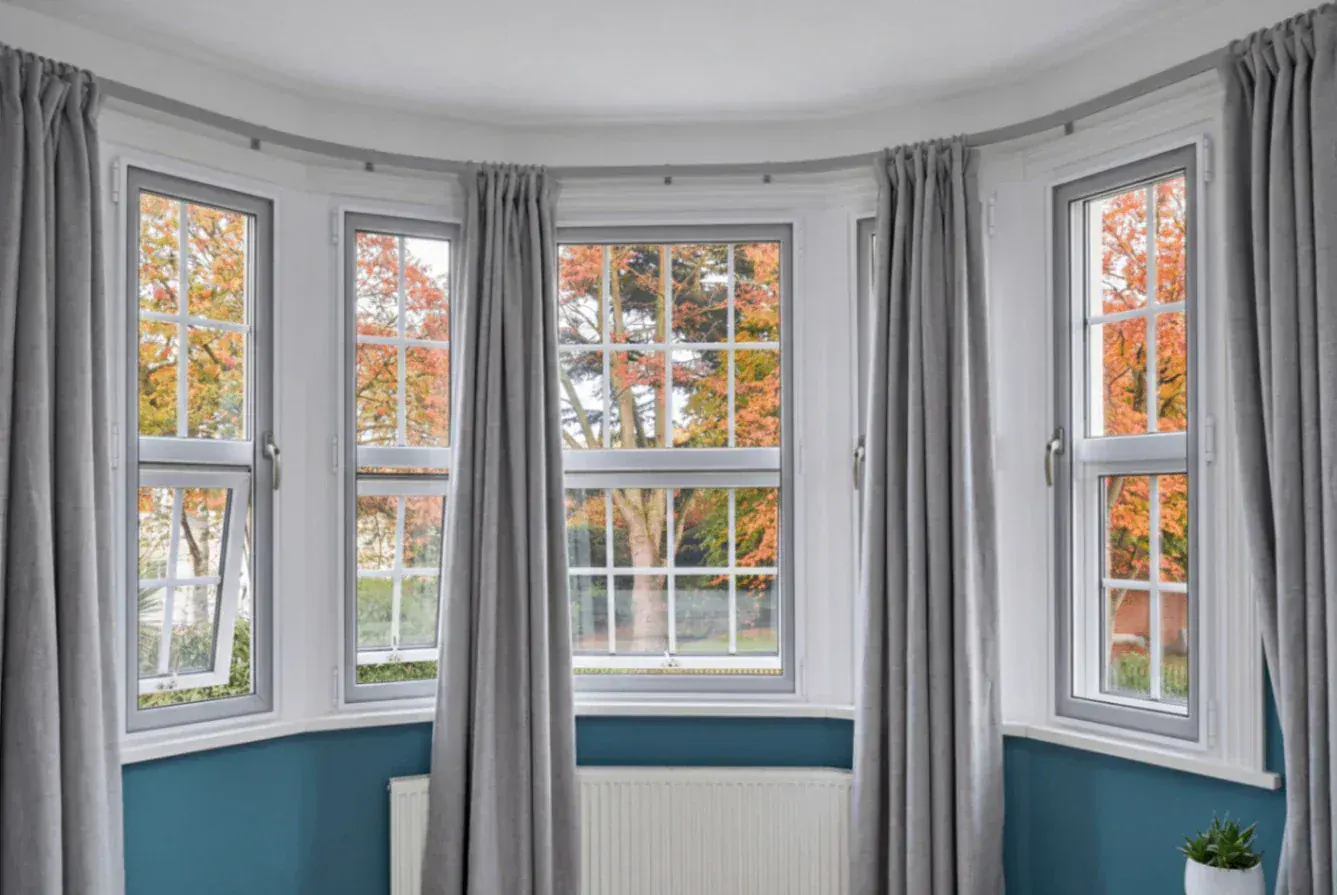 Secondary glazing around a bay window