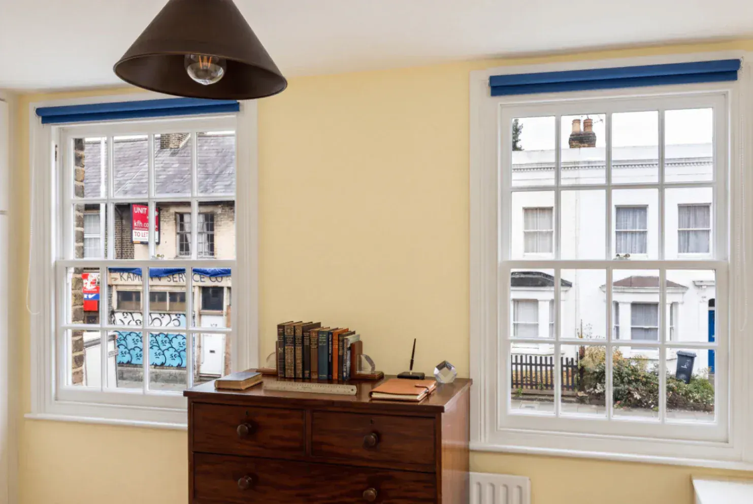 Secondary glazing in a period room with two windows