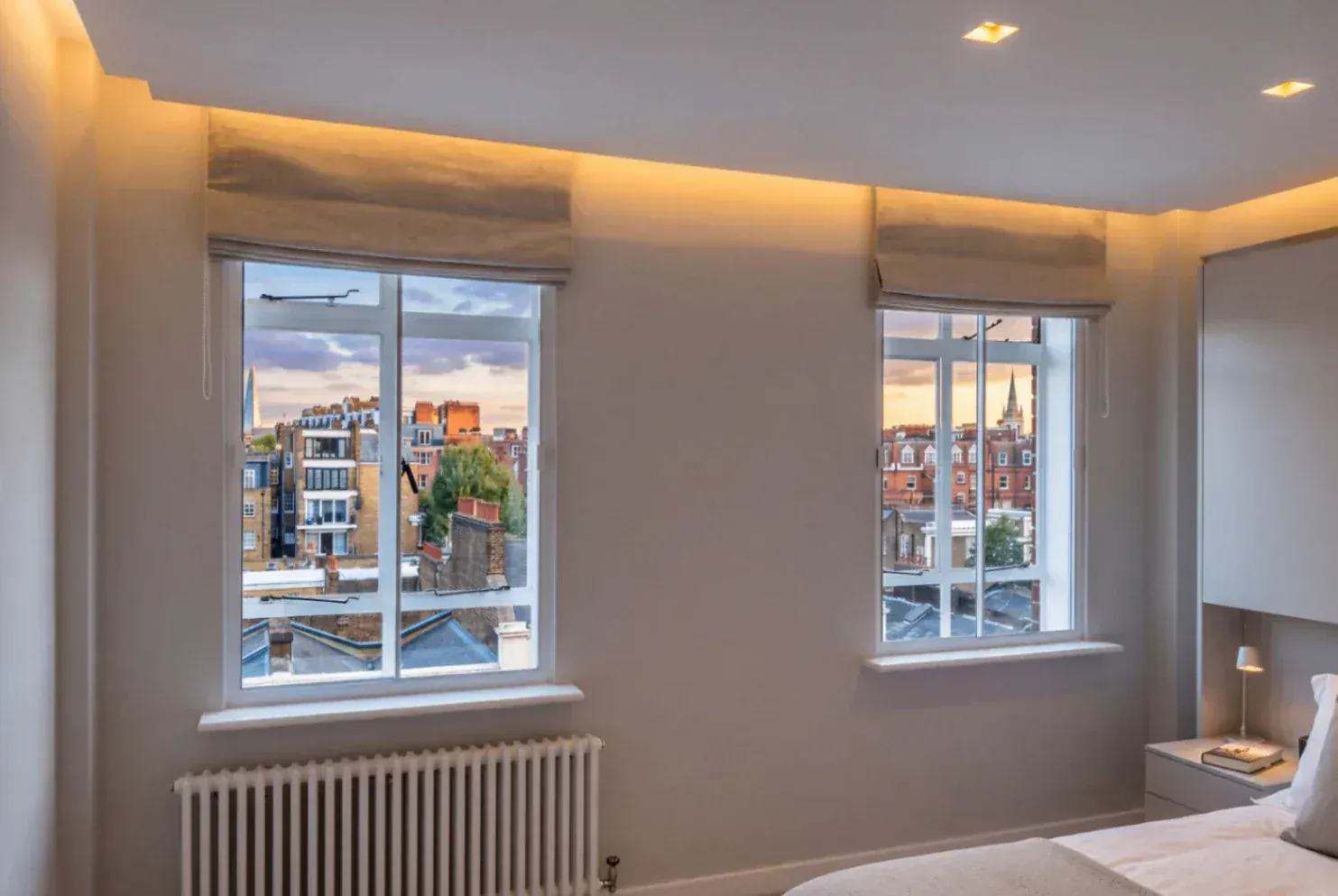 Secondary glazing in a bedroom with two sash windows