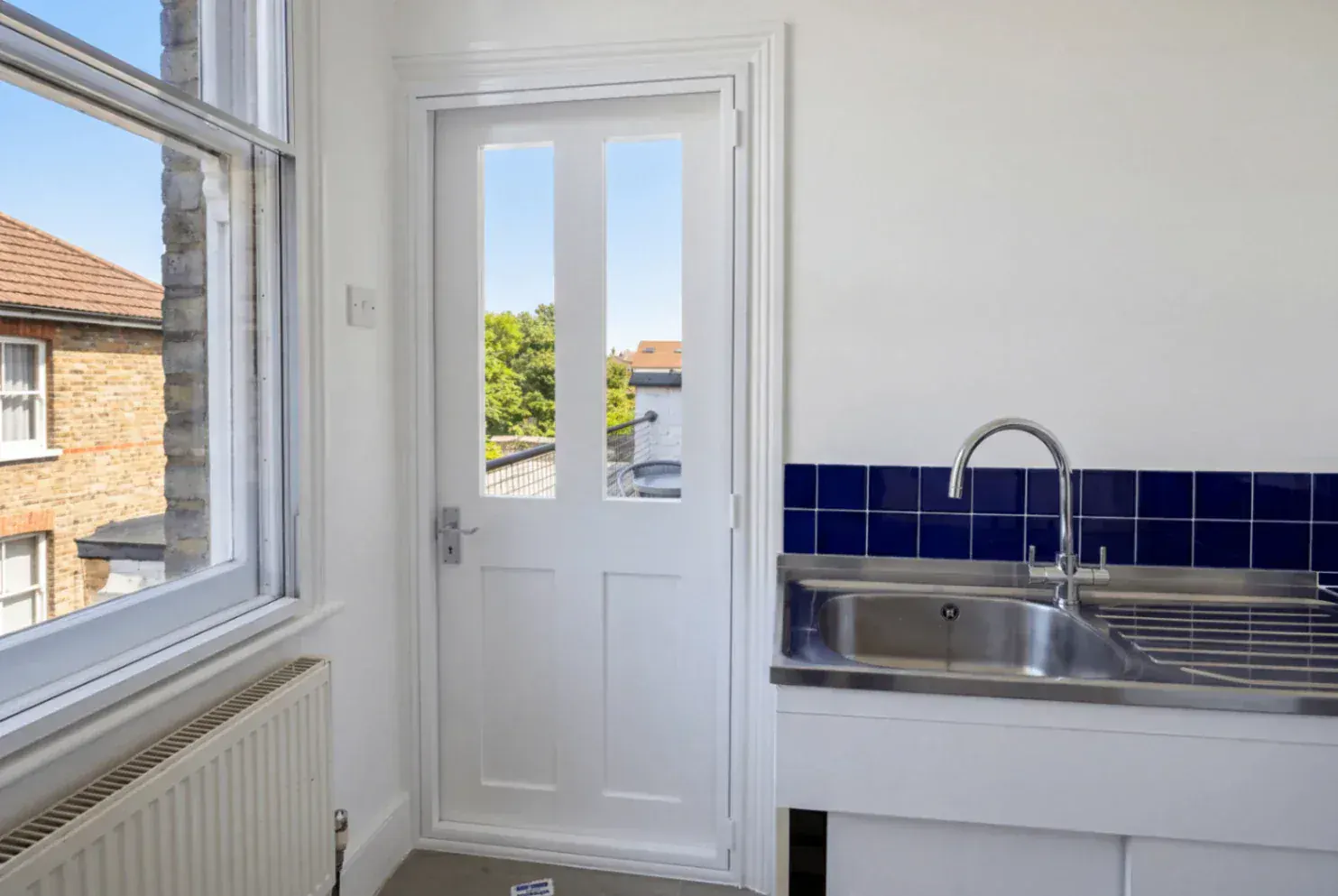 Secondary glazing beside a glazed door