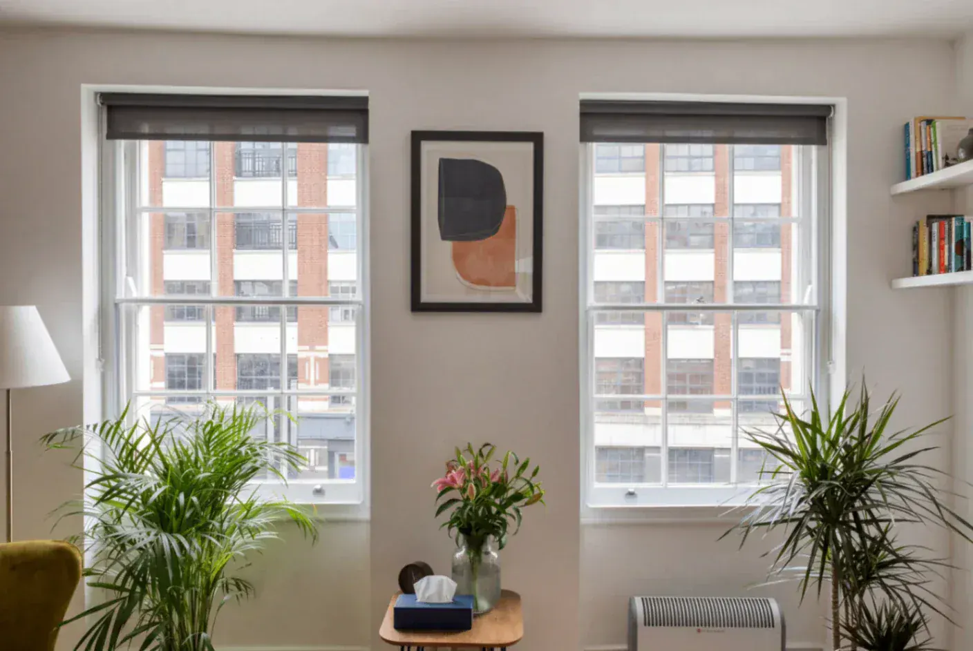 Secondary glazing in a room with two sash windows