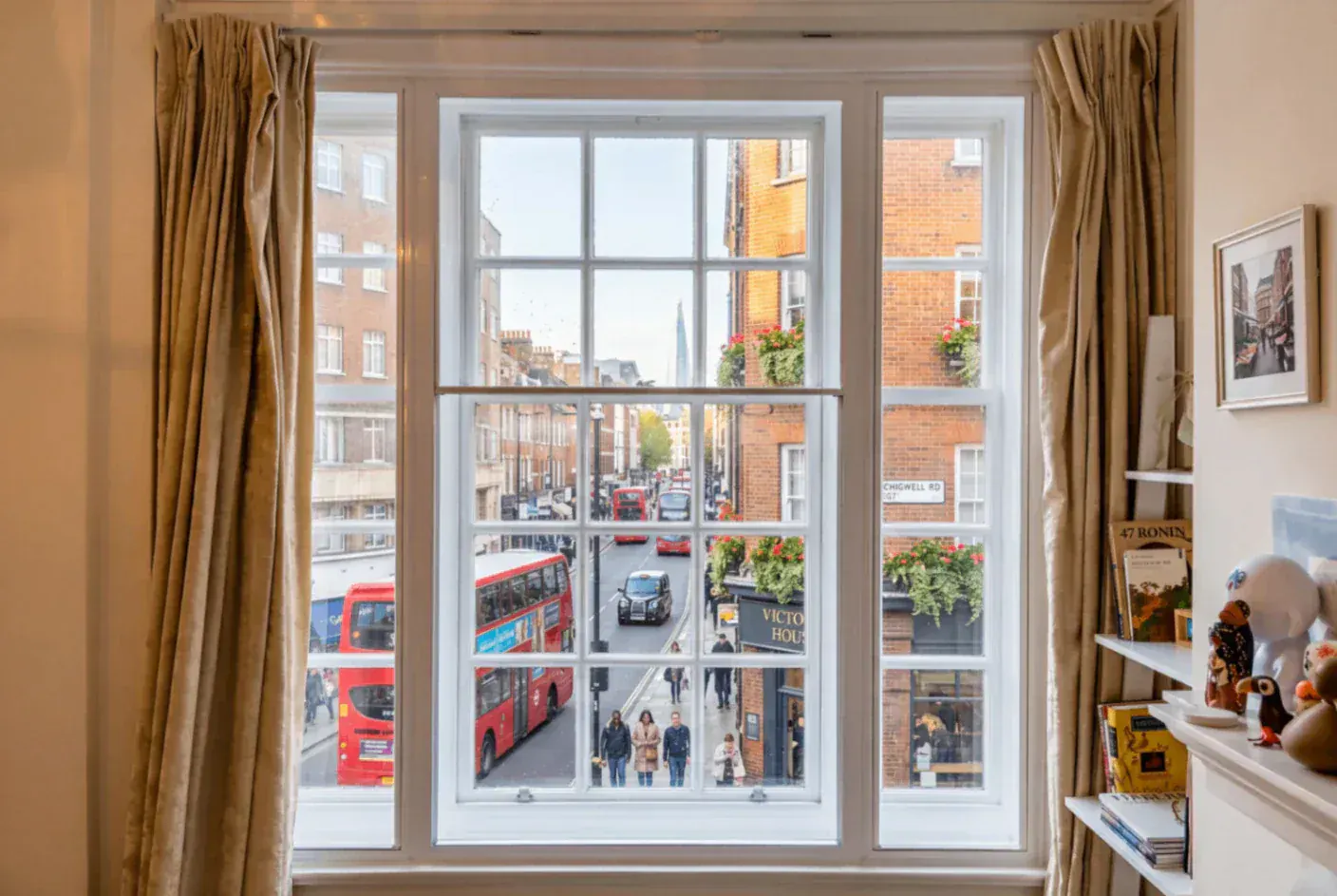 Secondary glazing in a sash window overlooking a city street