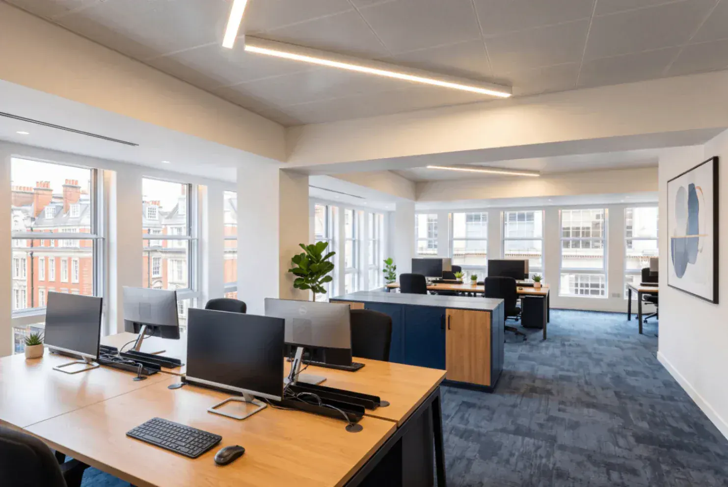 Secondary glazing across windows in a commercial office