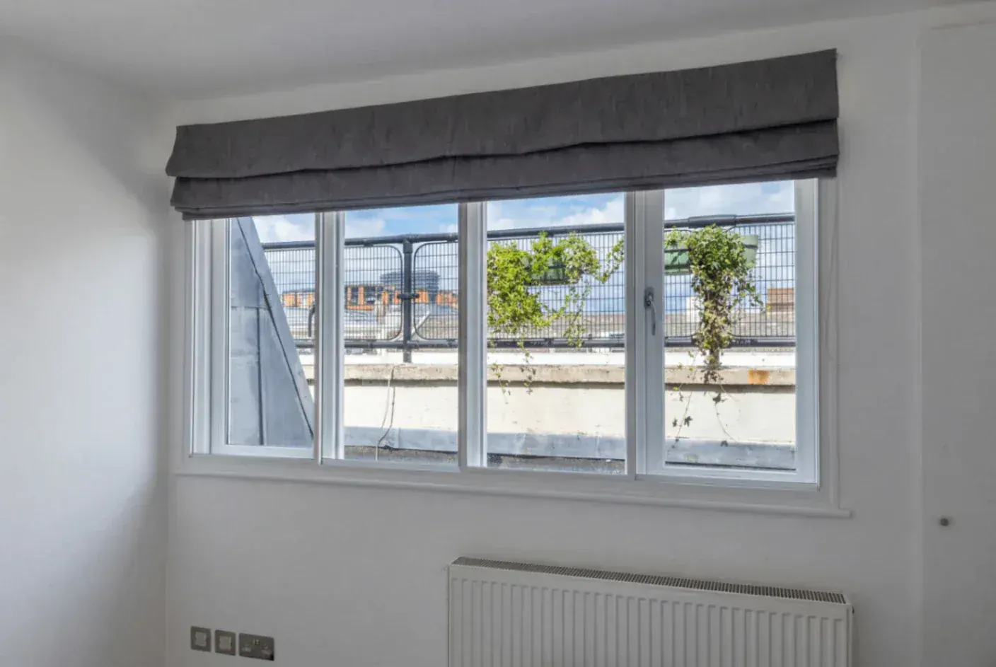 Secondary glazing in a room with a wide window