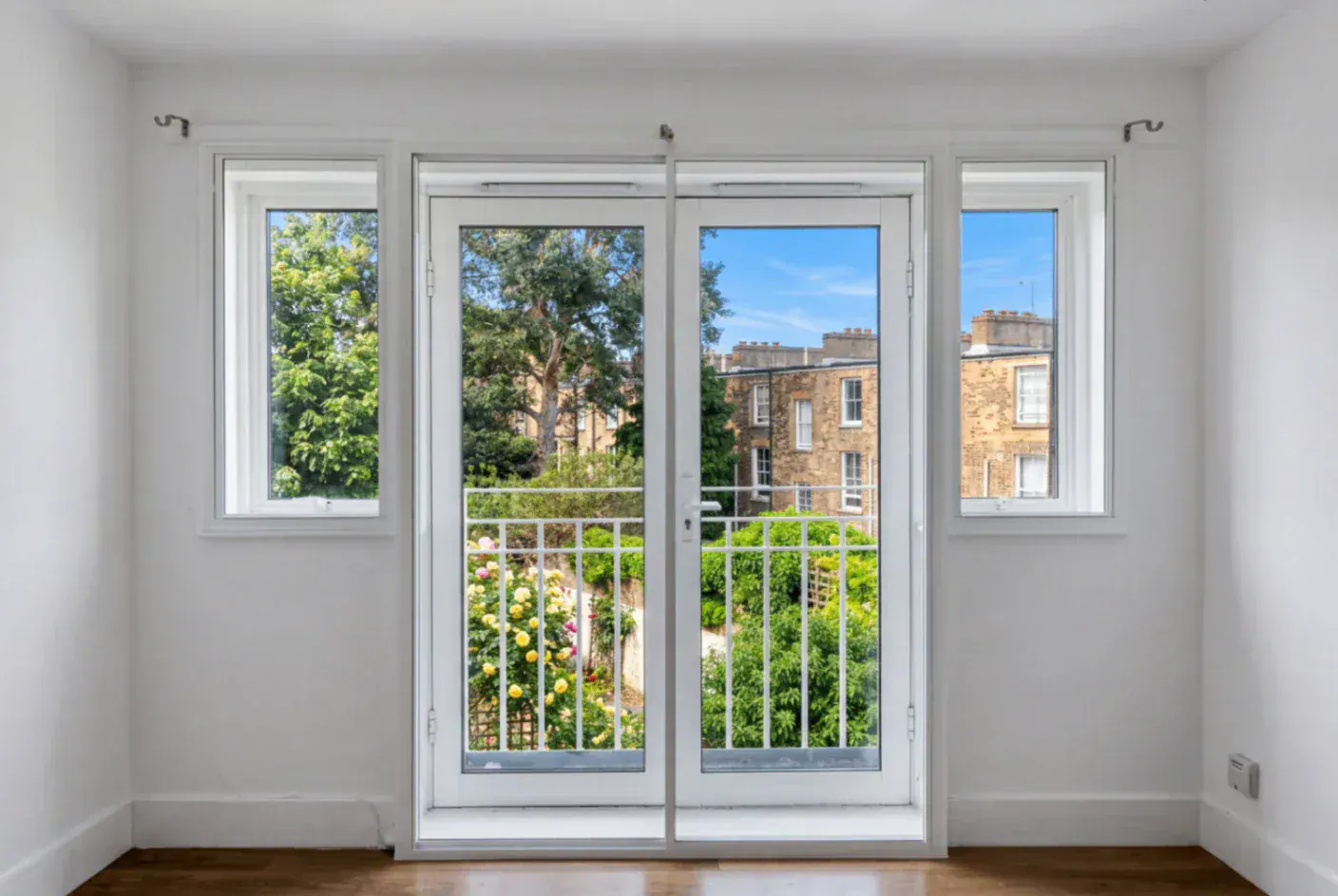 Secondary glazing on glazed doors with side windows