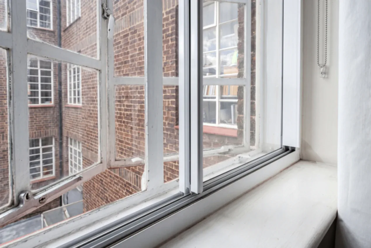Secondary glazing detail at a sash window
