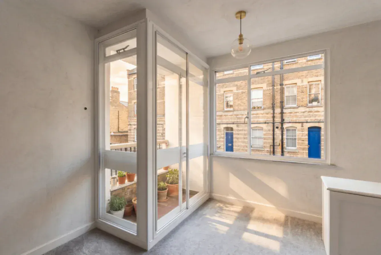 Secondary glazing beside glazed doors